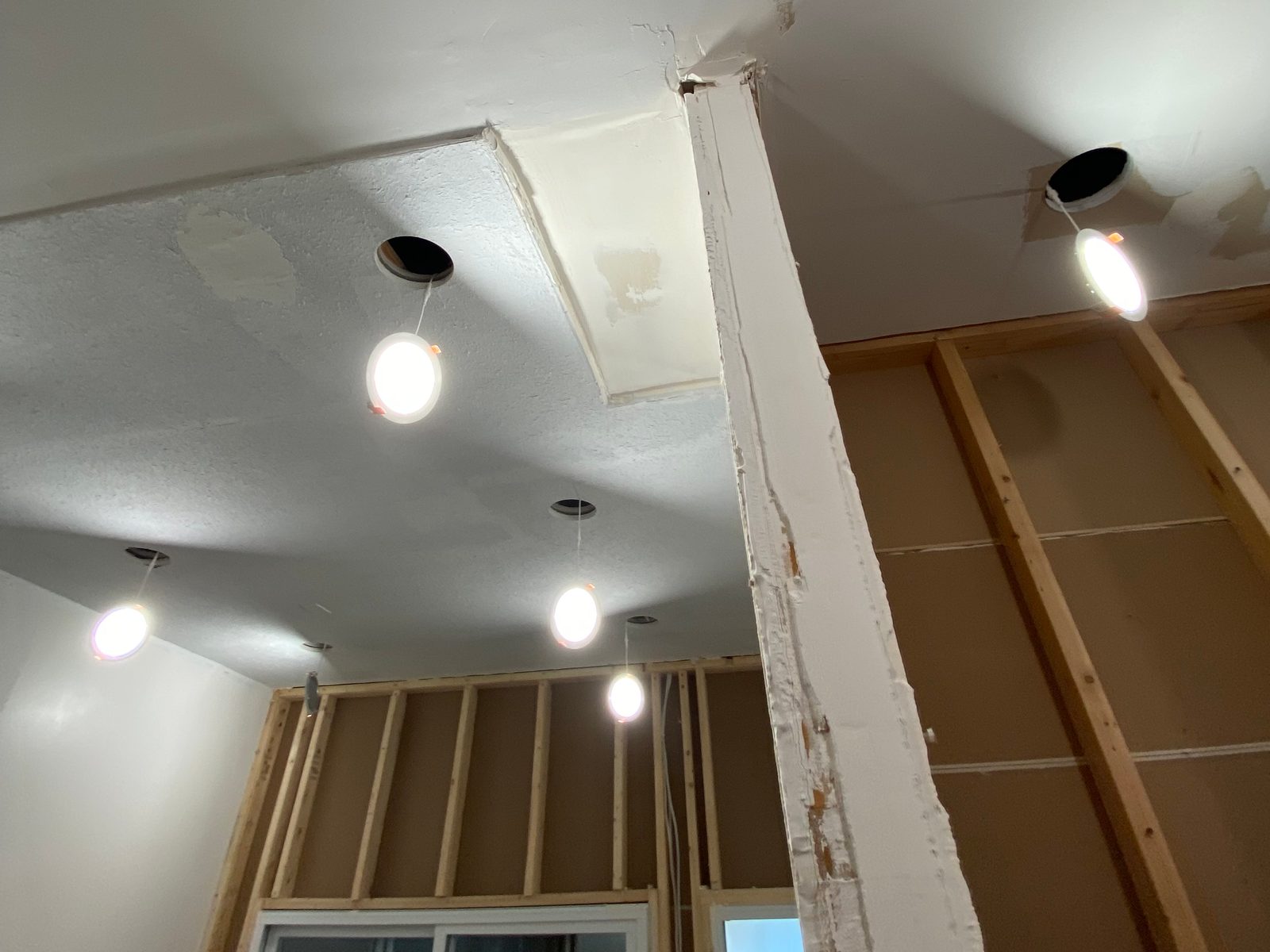 Textured Ceiling & Worn Post by Aymont Drywall