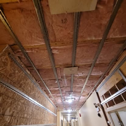 Hallway Insulation by Aymont Drywall