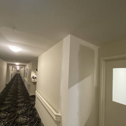 Hallway Drywall Repair by Aymont Drywall